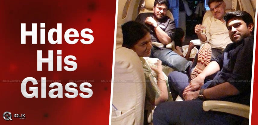 chiranjeevi-hides-his-glass-while-on-flight