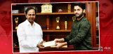 nithin-handovers-10lakh-cheque-to-cm-kcr