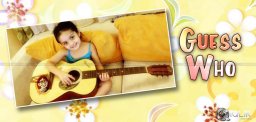 ajith-shalini-daughter-anushka-playing-guitar